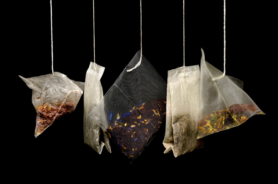 Tea bags on a black background